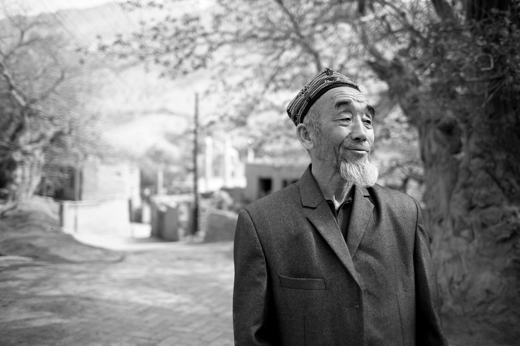 Un anziano uiguro in un villaggio vicino a Turpan © Maxime Crozet