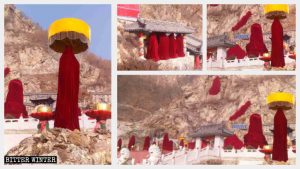 Le statue buddhiste che si trovano all'aperto nella Grotta dei mille Buddha avvolte in teli rossi