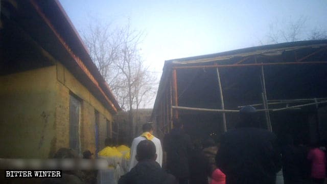  Believers attend an open-air Mass in Xiezhuang village.