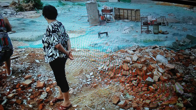 Le case di 57 famiglie nel villaggio di Xiayuan ridotte in un mucchio di rovine